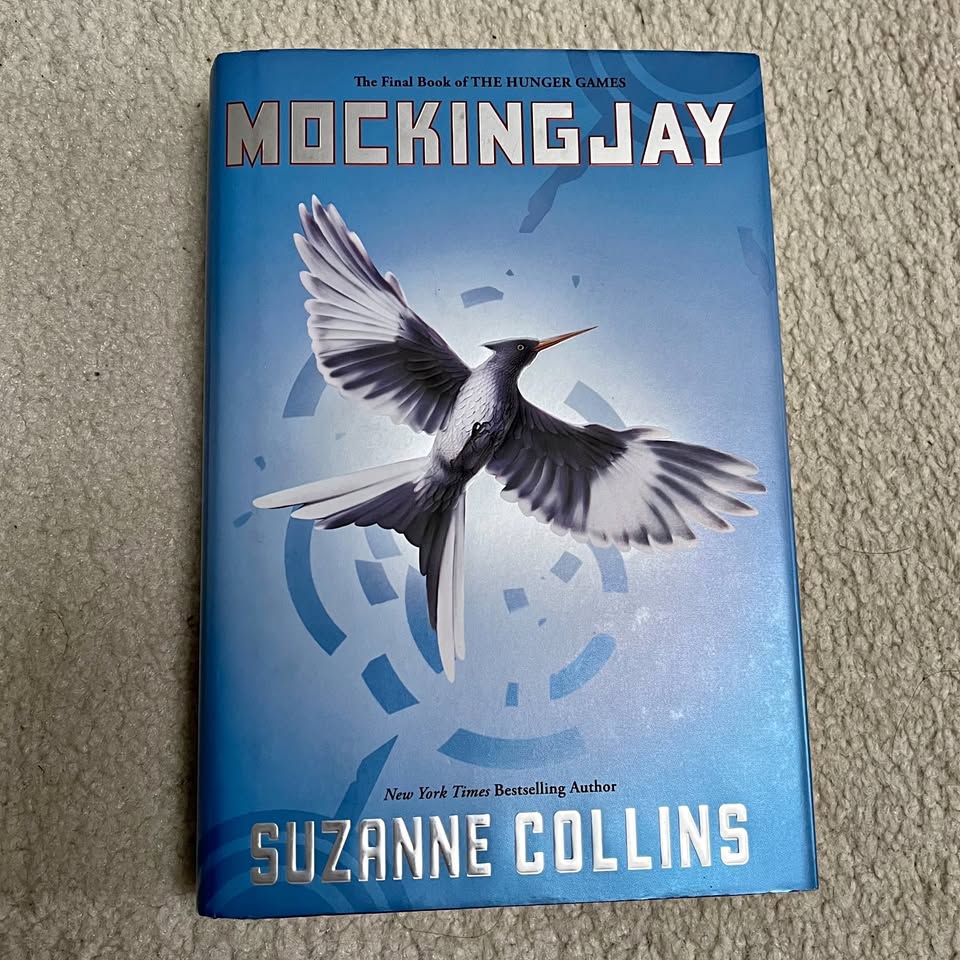 Mocking Jay - by Suzanne Collins (3rd Book)