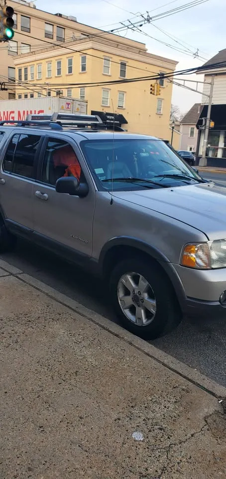 2002 Ford Explorer · Limited HEV Sport Utility 4D image indicator(2)