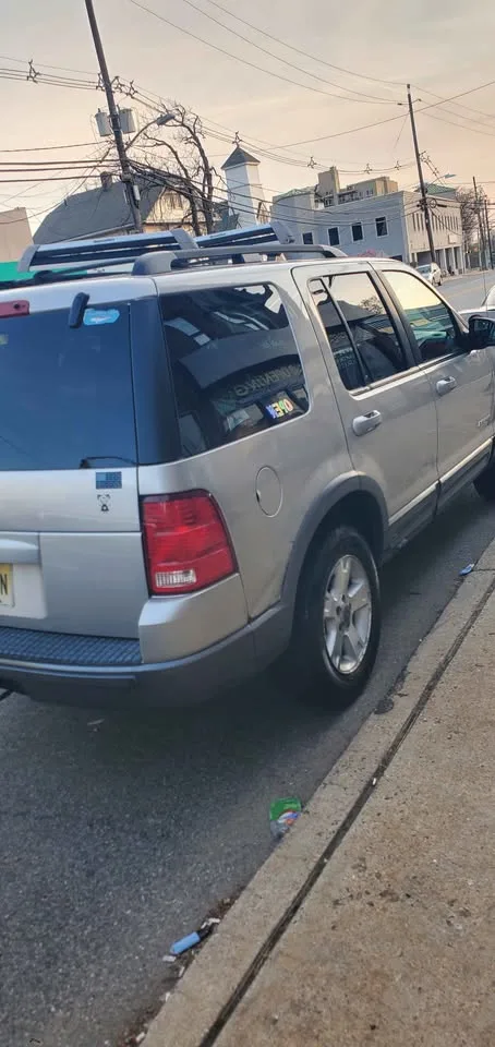 2002 Ford Explorer · Limited HEV Sport Utility 4D image indicator(3)