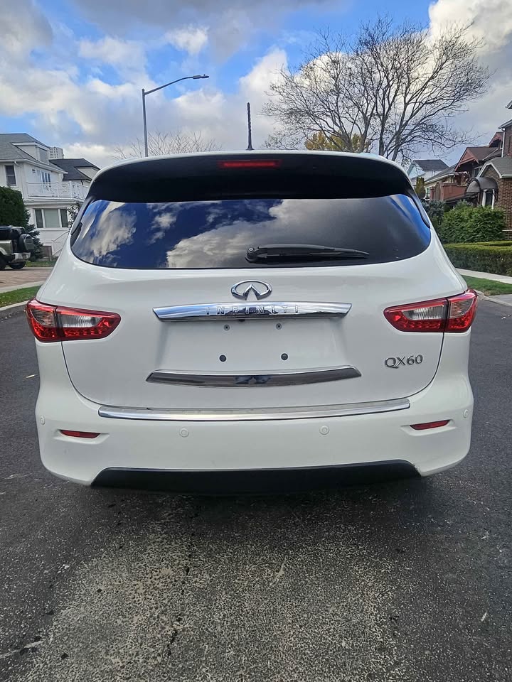 2014 Infiniti QX60 · LUXE Sport Utility 4D - photo 4