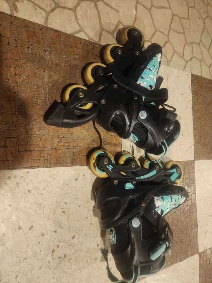Roller blades (black green small/black red big)each 20$ image indicator(2)