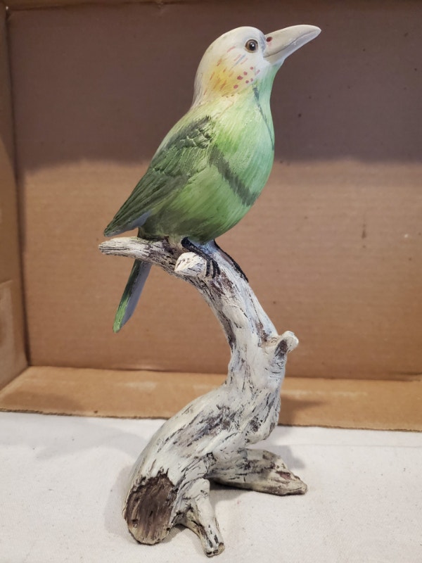 Green Bird on a Branch