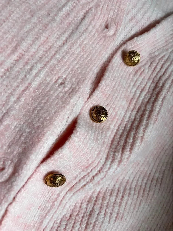 Pink cardigan woman image indicator(5)