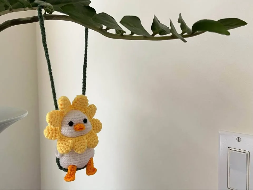 Crochet yellow duck flower head hanging decor image indicator(5)