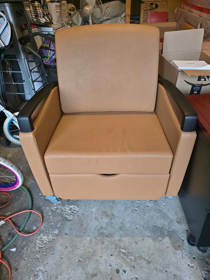 3 Leather lounge chairs with 1 pull out chair