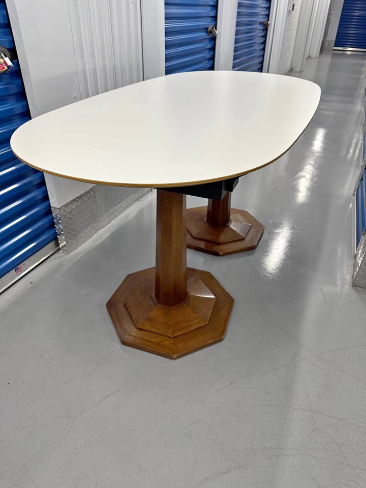 Unique Oval Table + 4 swivel bar-height chairs.