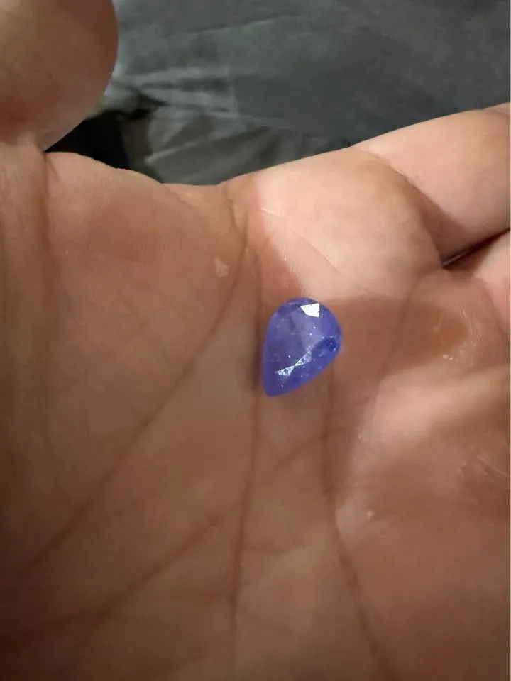 5.98 crt natural tanzanite - appraised at $5300 image indicator(3)