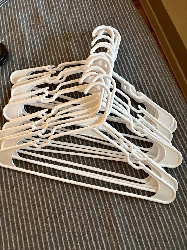 16 White Plastic Hangers thumbnail