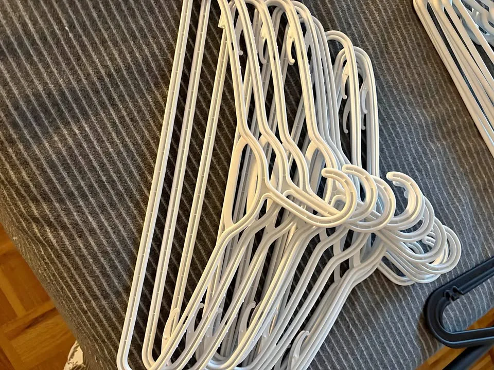 12 White Plastic Hangers thumbnail