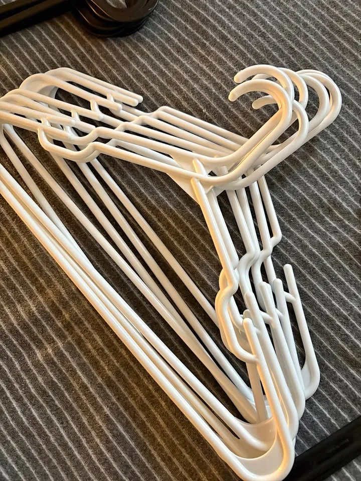 8 White Plastic Hangers thumbnail