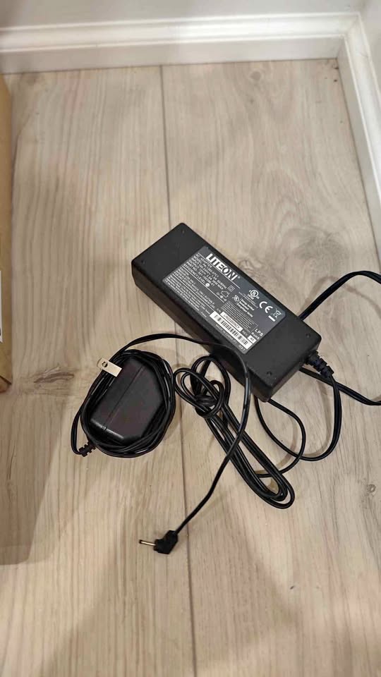 Full box of chargers and different cables