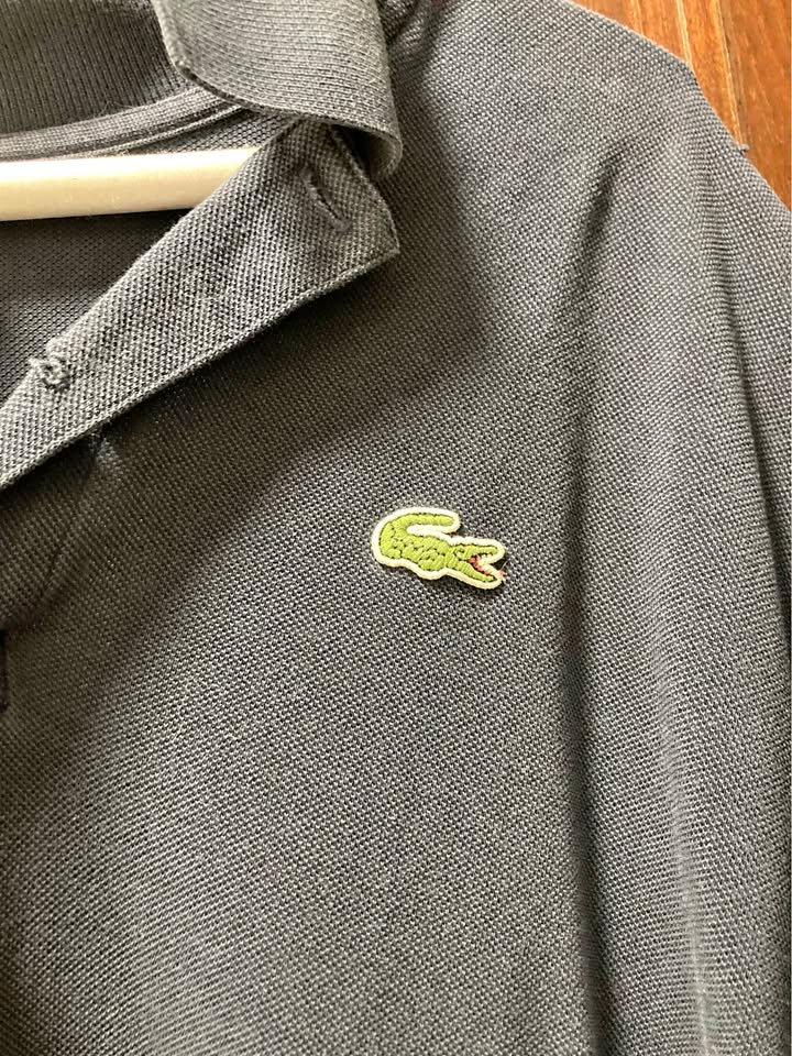 Navy Lacoste polo size 7