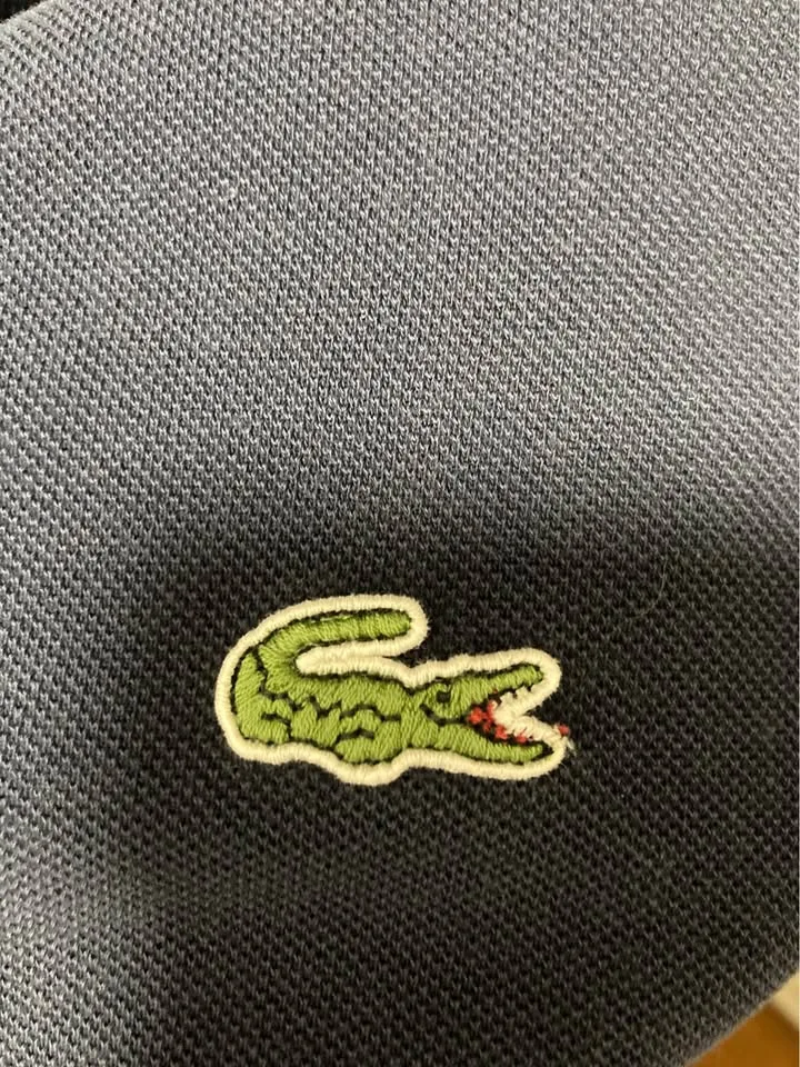 Navy Lacoste polo size 7 image indicator(7)