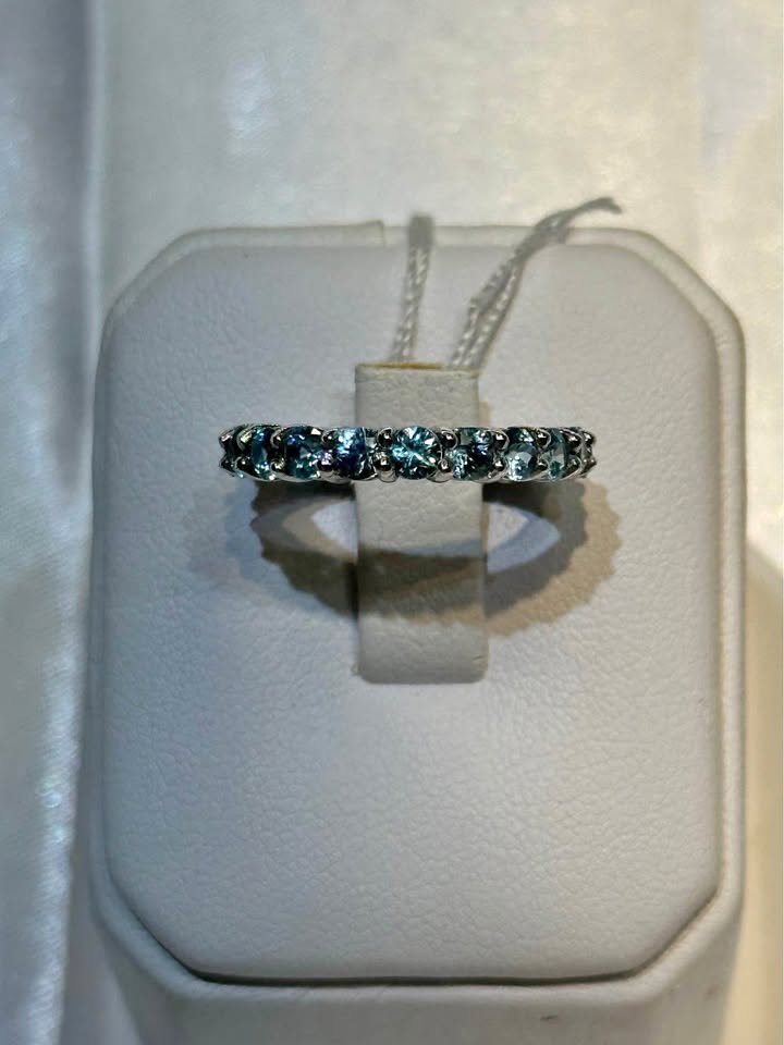 18k gold Birthstone Aquamarine Eternity. Size 4 3/4 ring