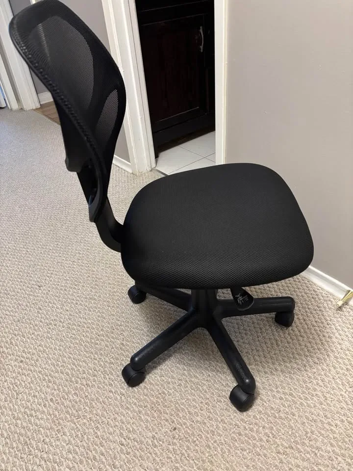 Black computer desk chair in casters. image indicator(2)