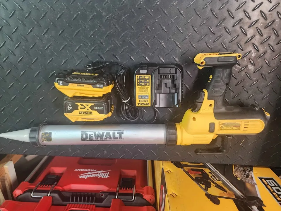 Dewalt cordless caulking gun with 2 battery and charger image indicator(2)