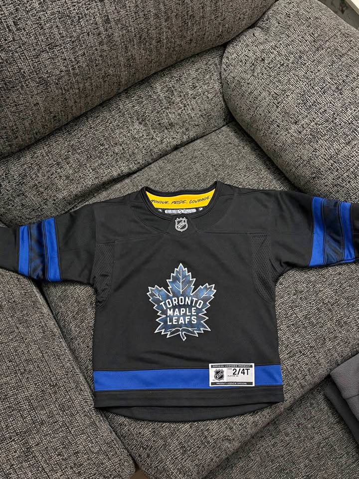 Toddler Austin Matthew’s Toronto maple leafs jersey