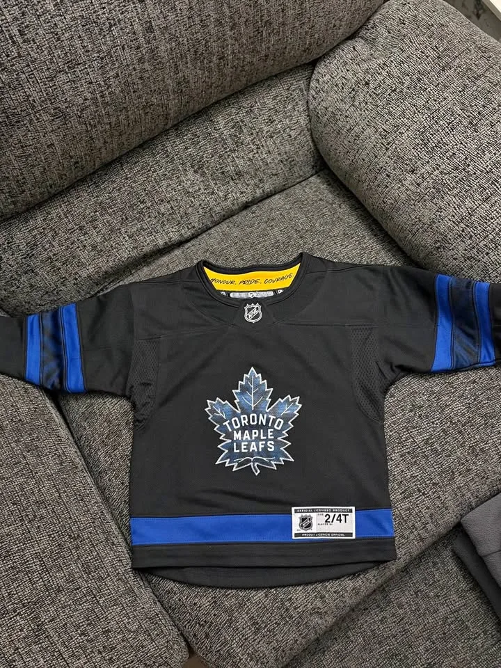 Toddler Austin Matthew’s Toronto maple leafs jersey