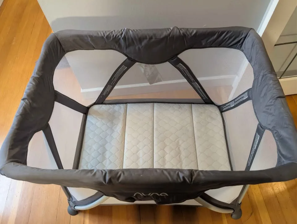 Nuna sena travel crib image indicator(2)