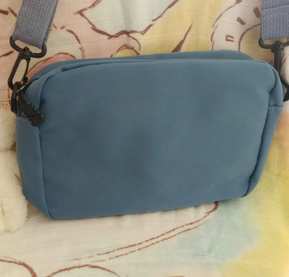 Blue Shoulder Bag with Paddington Bear Charm image indicator(4)