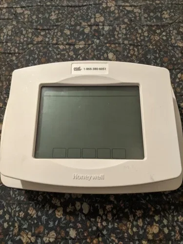 Used Honeywell thermostat T5060F7088