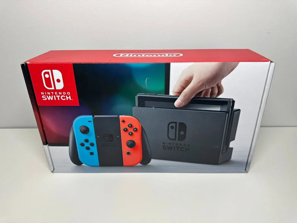 Nintendo Switch Neon Red/Blue – $250 Burlington thumbnail