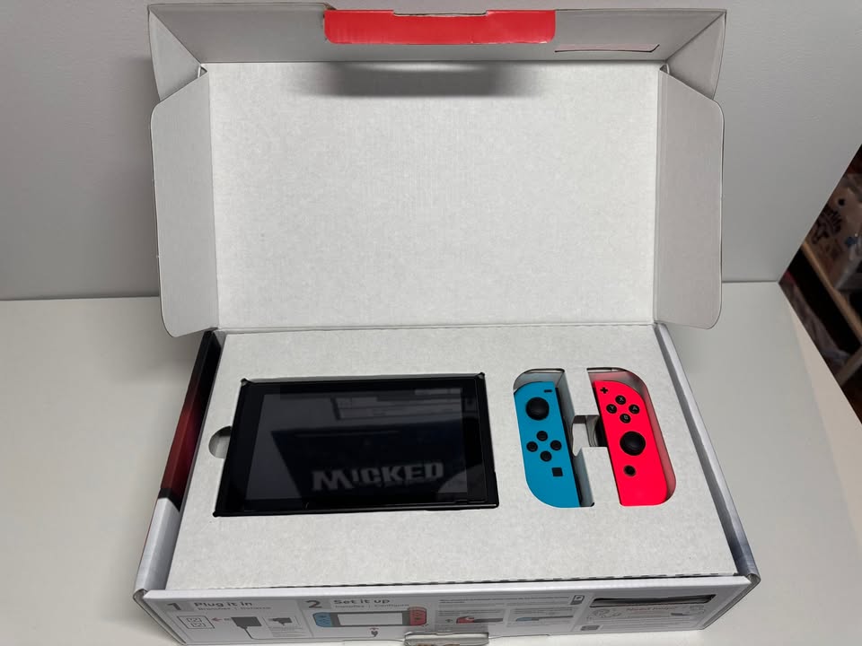 Nintendo Switch Neon Red/Blue – $250 Burlington - photo 3