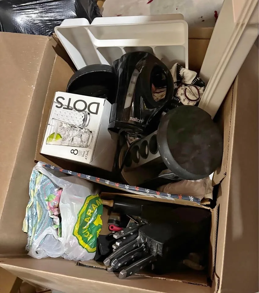 Large assortment of kitchen appliances and everyday items