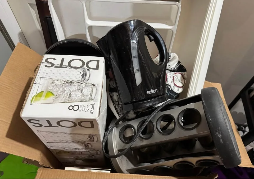 Large assortment of kitchen appliances and everyday items image indicator(4)