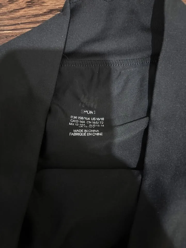 H&M Black Tennis Skirt with Built-In Biker Shorts image indicator(2)