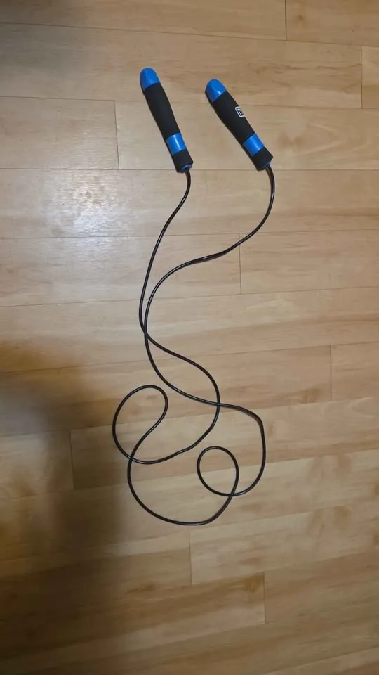 Weighted skipping rope- adjustable length Current  60'' but is a image indicator(2)