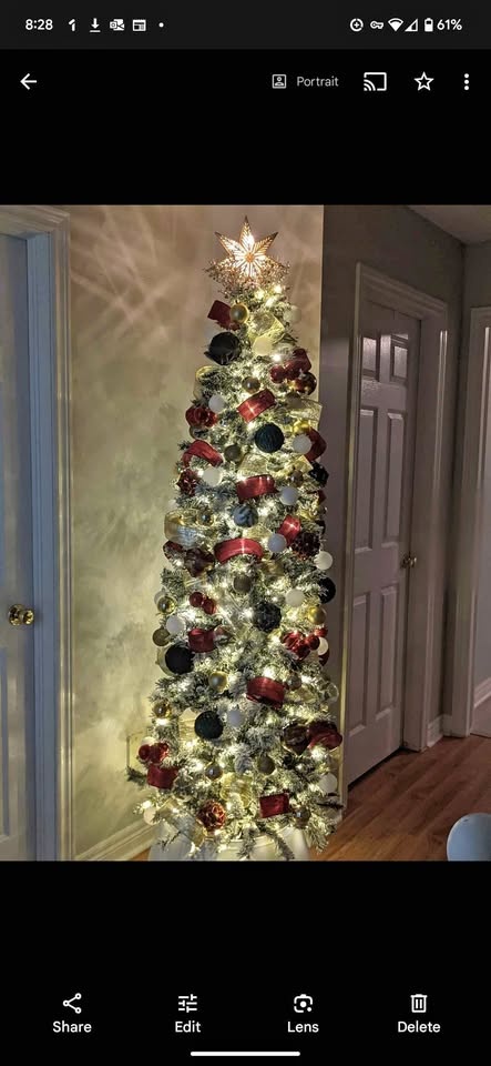 8ft flocked pre-lit Christmas tree and decorations