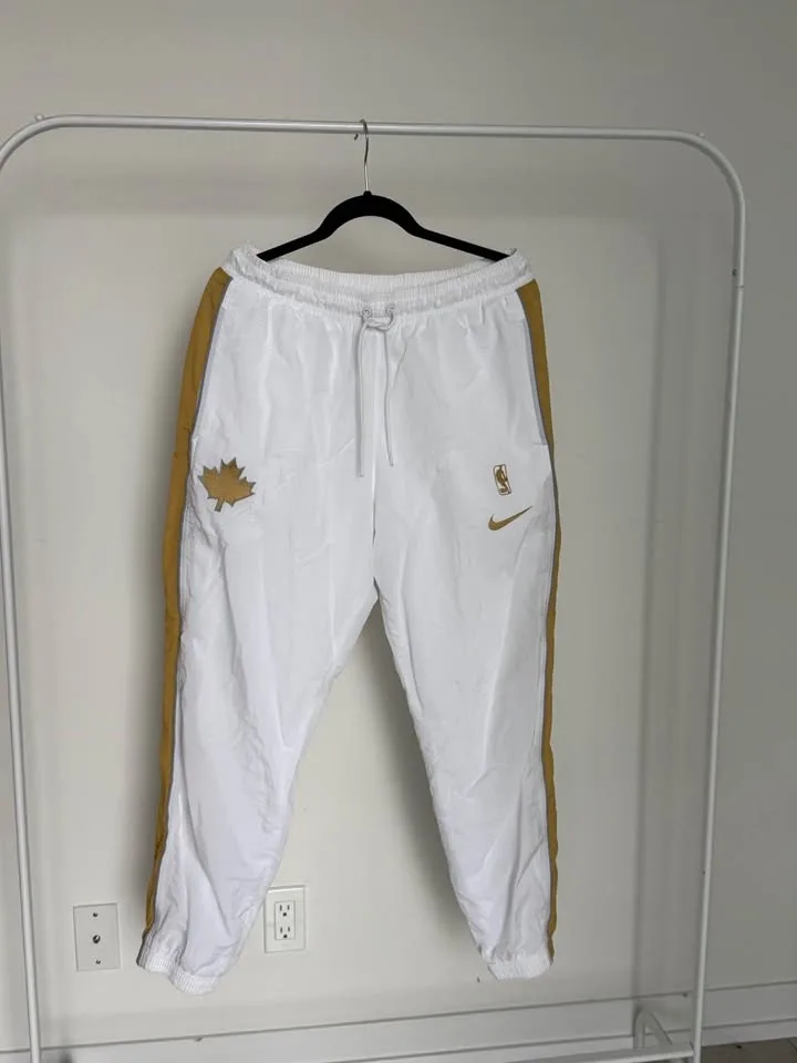 White Nike NBA Pants with Gold Accents L image indicator(2)