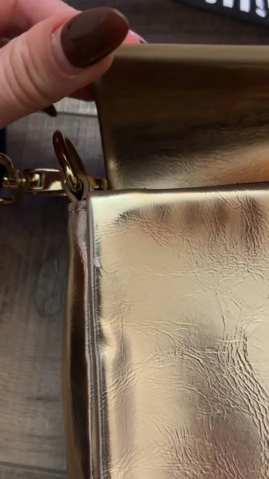 paco rabanne gold clutch with detachable strap image indicator(4)