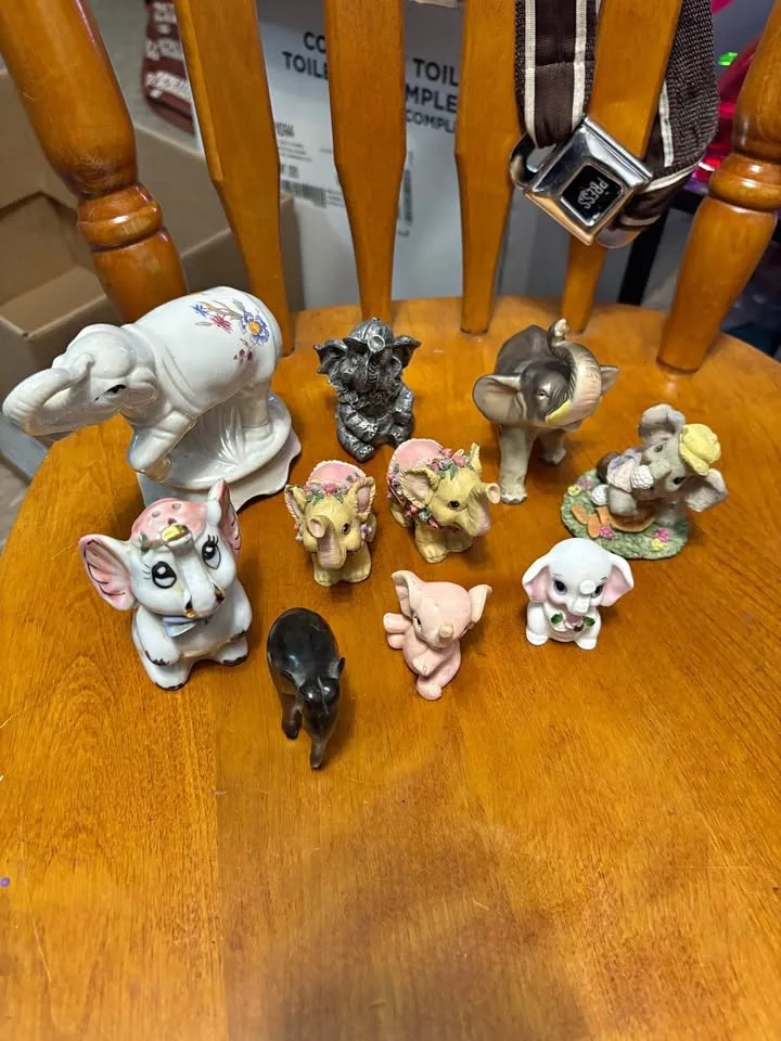 Grass, elephant figurines ￼