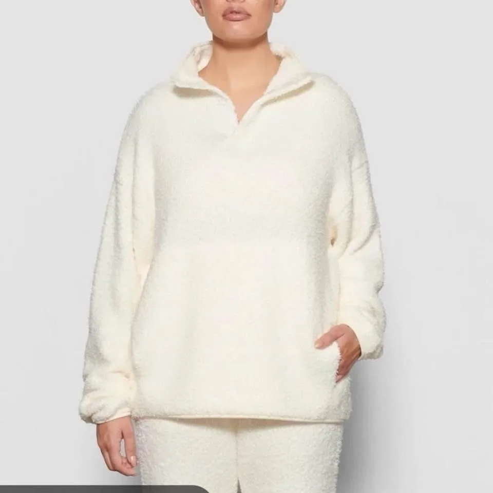 Skims cozy knit pullover pink image indicator(2)