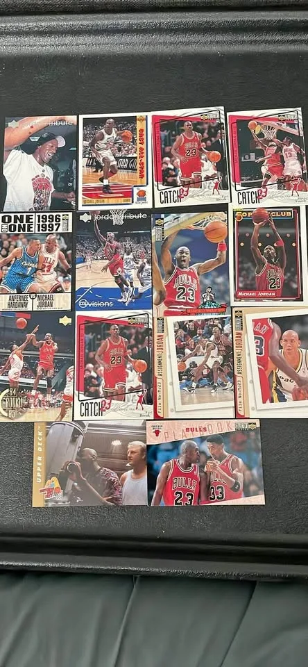 Fourteen (14) Michael Jordan Basketball Cards - All in Good to G