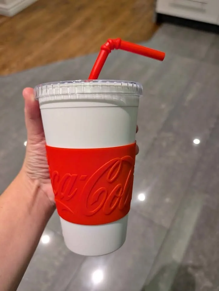 3 hard plastic coca cola cups with straws