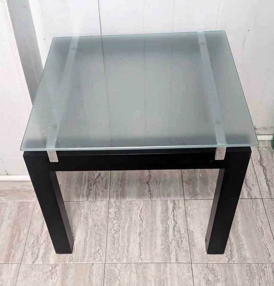 Glass corner table