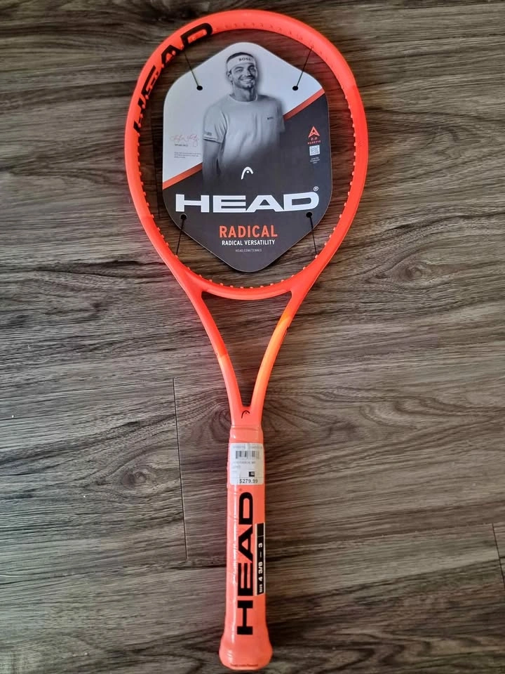 Tennis Head racket and Wilson