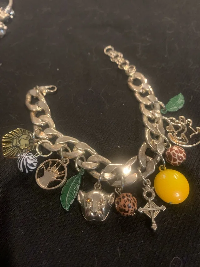 Disney Lion King Bracelet deluxe many charms $50 OBO
