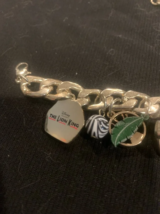 Disney Lion King Bracelet deluxe many charms $50 OBO image indicator(3)