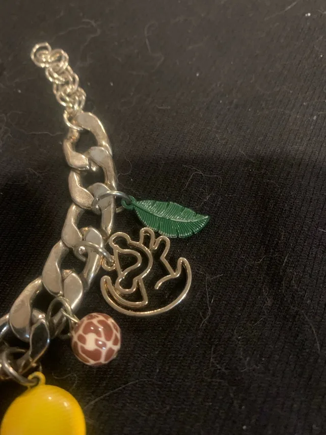 Disney Lion King Bracelet deluxe many charms $50 OBO image indicator(5)