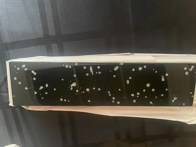 28-Piece Black Sparkle Tile Set – $60