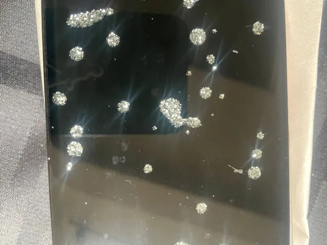 28-Piece Black Sparkle Tile Set – $60 image indicator(2)