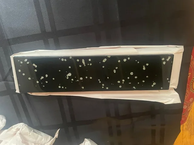 28-Piece Black Sparkle Tile Set – $60 image indicator(3)