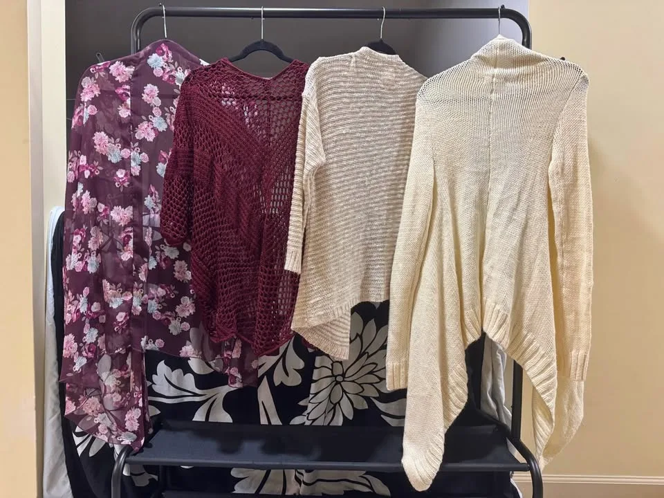 Assorted Button Up Shirts And Cardigans image indicator(4)