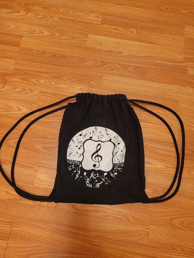 Black Drawstring Backpack with Musical Note Design