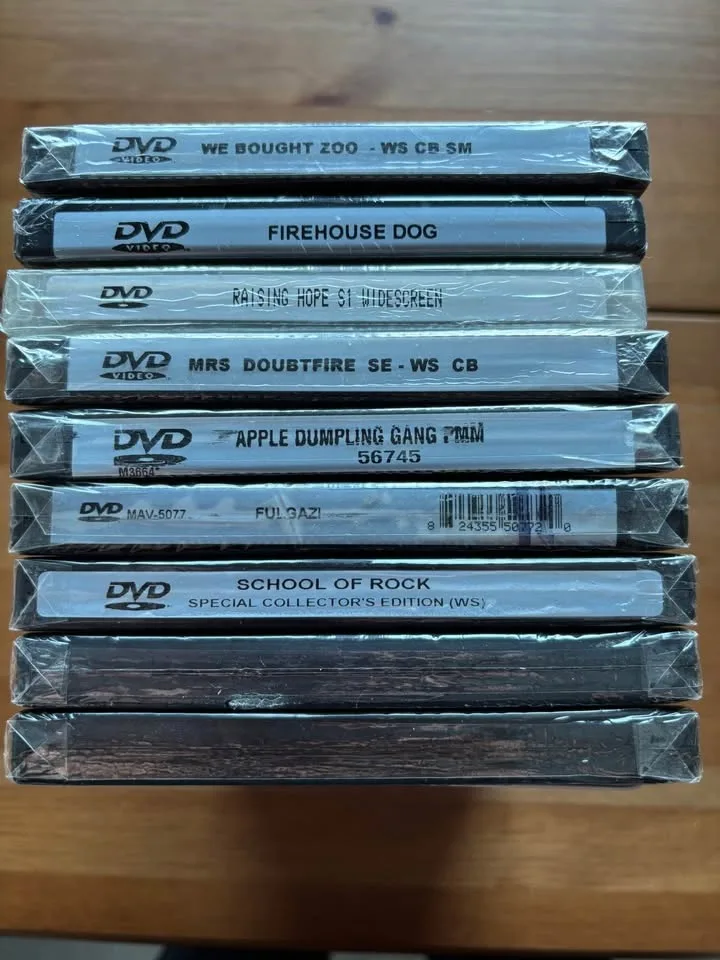 All For $15 9 Family Fun DVDS, 7 Never Opened image indicator(3)