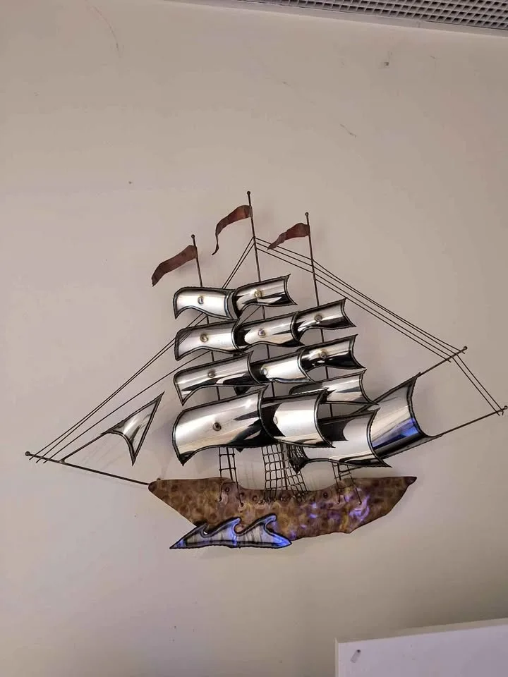 Metal wall sculpture sailing ship